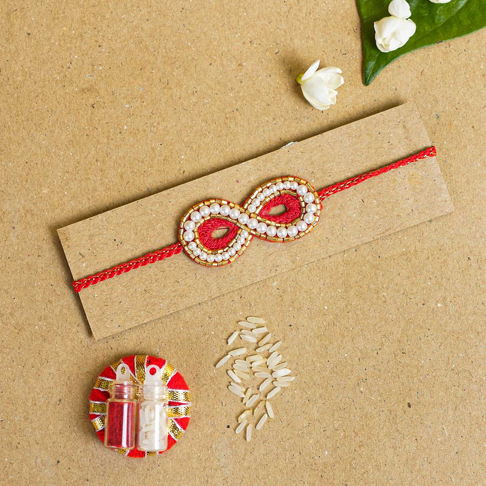 Handmade Beaded Infinity Rakhi With Roli Chawal - Packed with Rakhi Accessories
