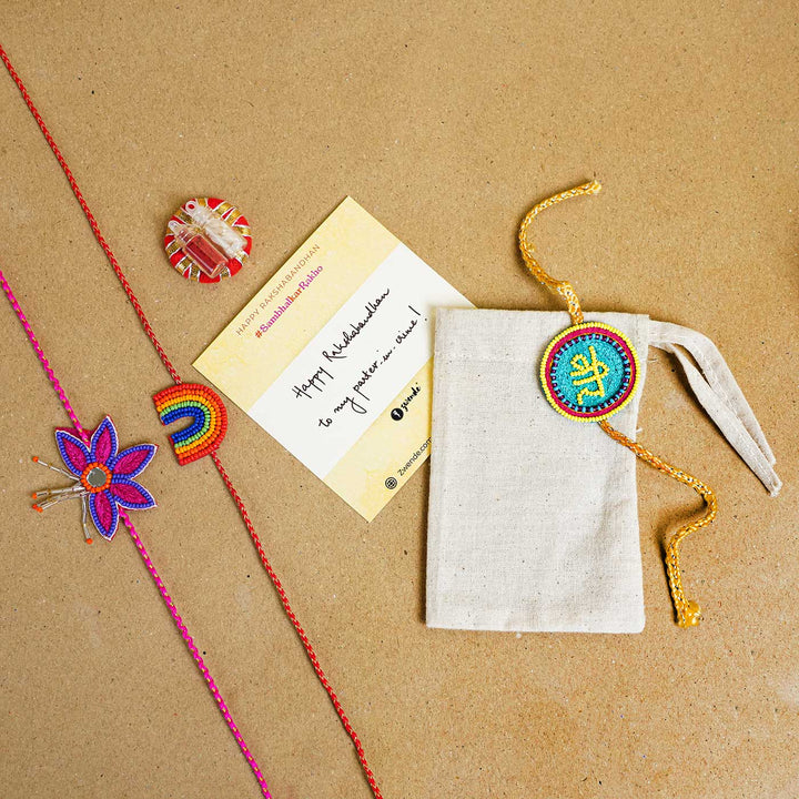 Handmade Beaded Bhai Rakhi With Roli Chawal - Packaging with multiple Rakhis and card