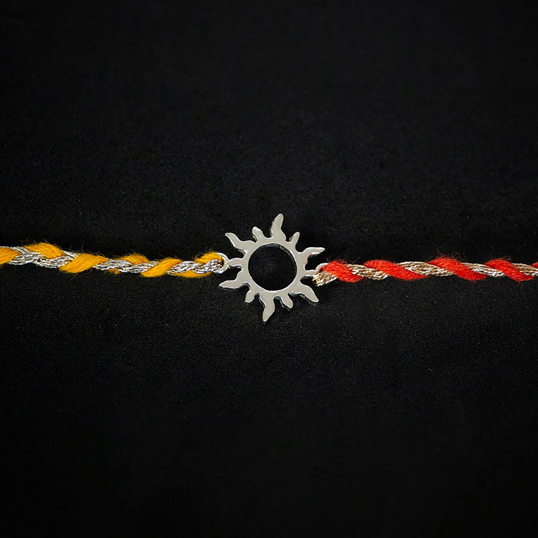 Handmade Aditya 925 Silver Rakhi With Roli Chawal For Brother - Close-up of central sun charm
