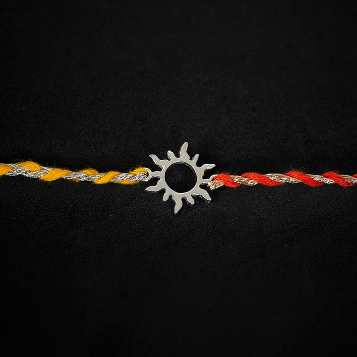 Handmade Aditya 925 Silver Rakhi With Roli Chawal For Brother - Close-up of central sun charm