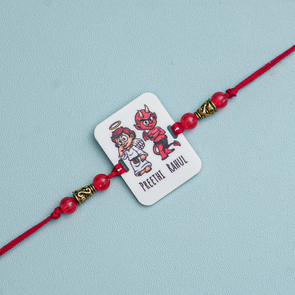 Personalized Handmade Printed Bro And Sis Acrylic Rakhi With Roli Chawal - Front View with Character Design