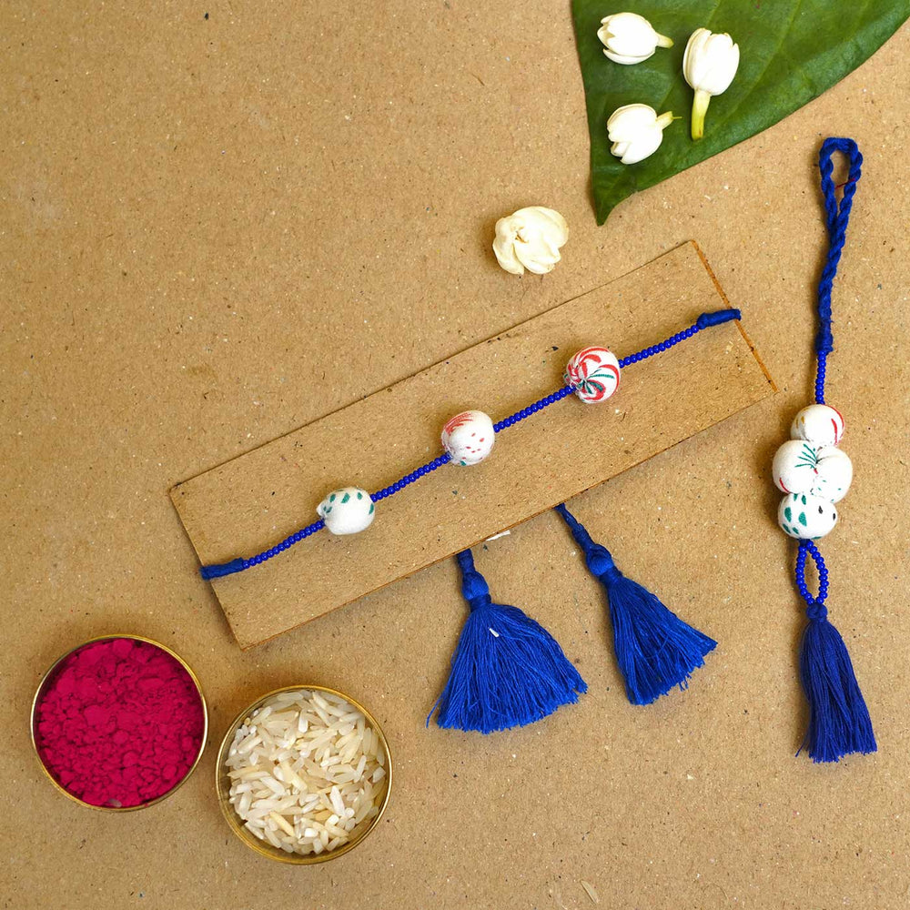 Handmade Shweth Potli Upcycled Fabric Bhaiya Bhabhi Rakhi With Roli Chawal Set Of 2 - Rakhi with rice and color powder