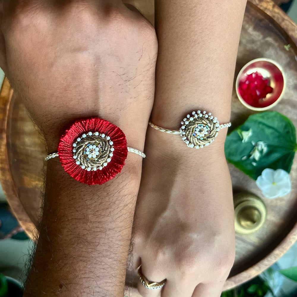 Handmade Zardozi Mustard And White Bead Work Rakhi With Wooden Box And Roli Chawal Set Of 2 - Worn on Both Wrists Close-up