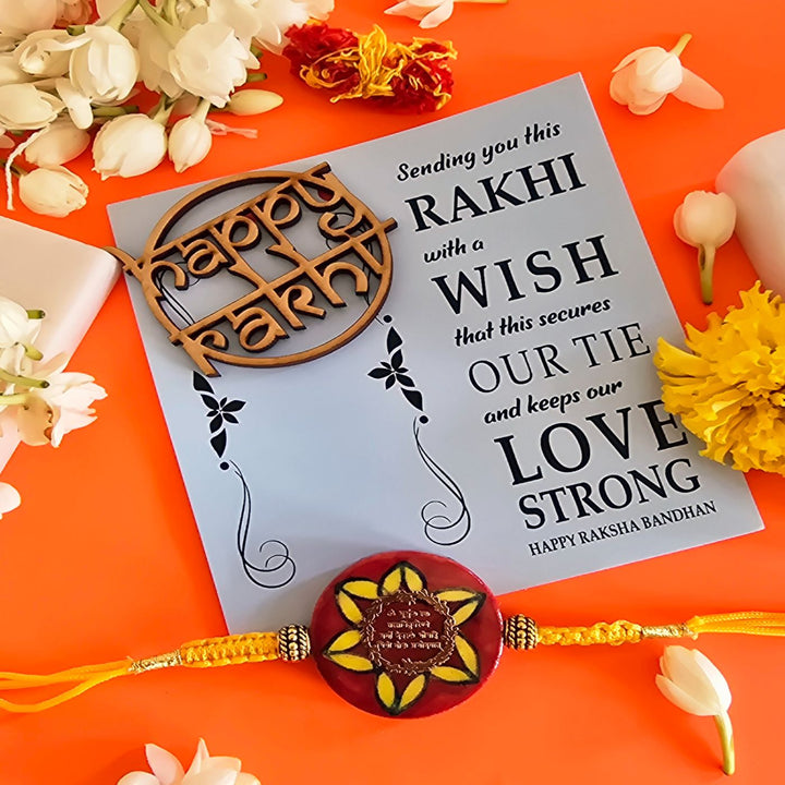 Handmade Red Gayatri Mantra Ceramic Rakhi With Roli Chawal For Brother - Flat lay with Rakhi poem card