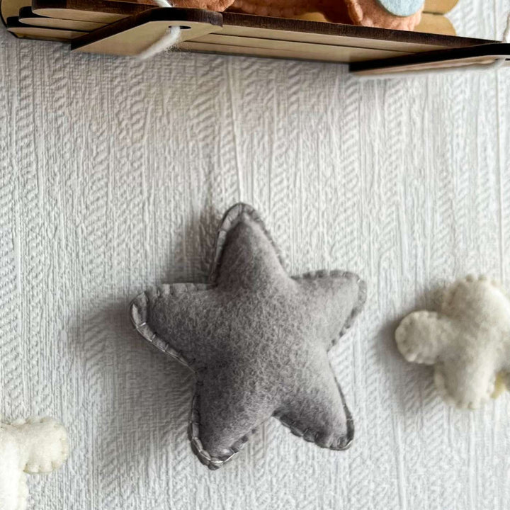 Personalized Blue Teddy On A Swing Theme Felt Kids Name Plate - Top View of Star Pillow Placement