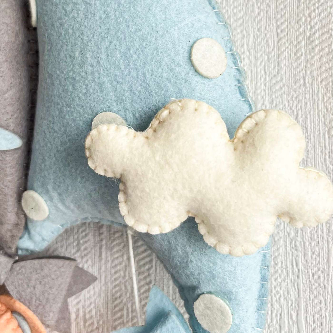 Personalized Blue Teddy On A Swing Theme Felt Kids Name Plate - Close-up of Decorative Pillow Details