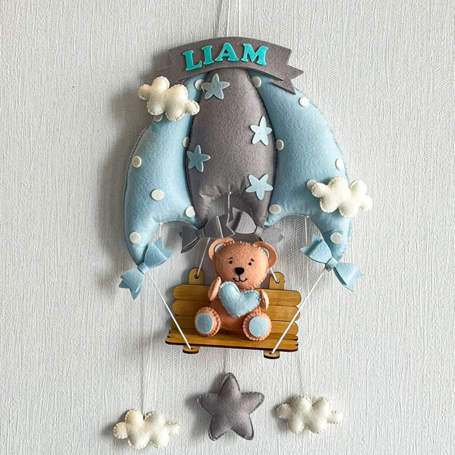 Personalized Blue Teddy On A Swing Theme Felt Kids Name Plate - Front View Hanging on Wall