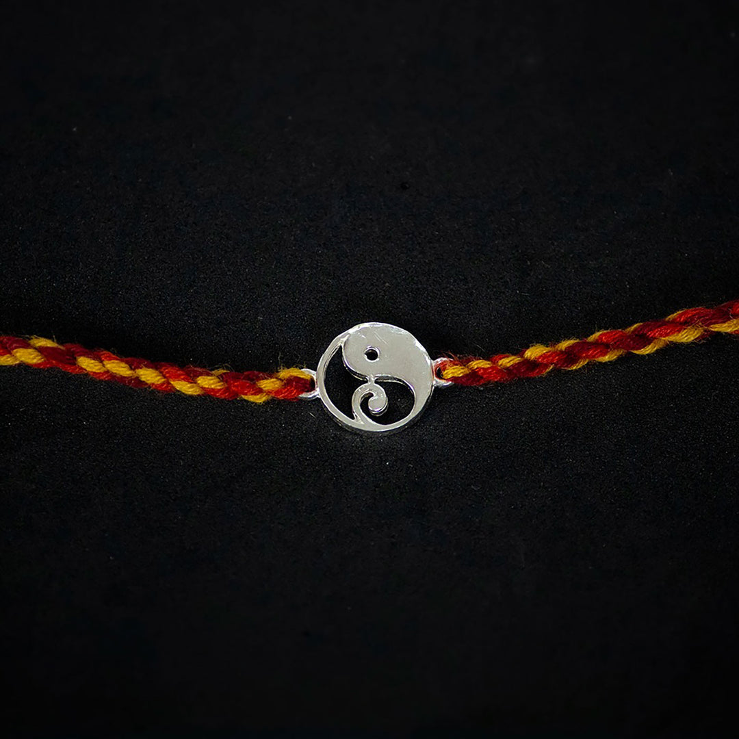 Handmade Bappa 925 Silver Rakhi With Roli Chawal For Brother - Close-up of Pendant Centerpiece