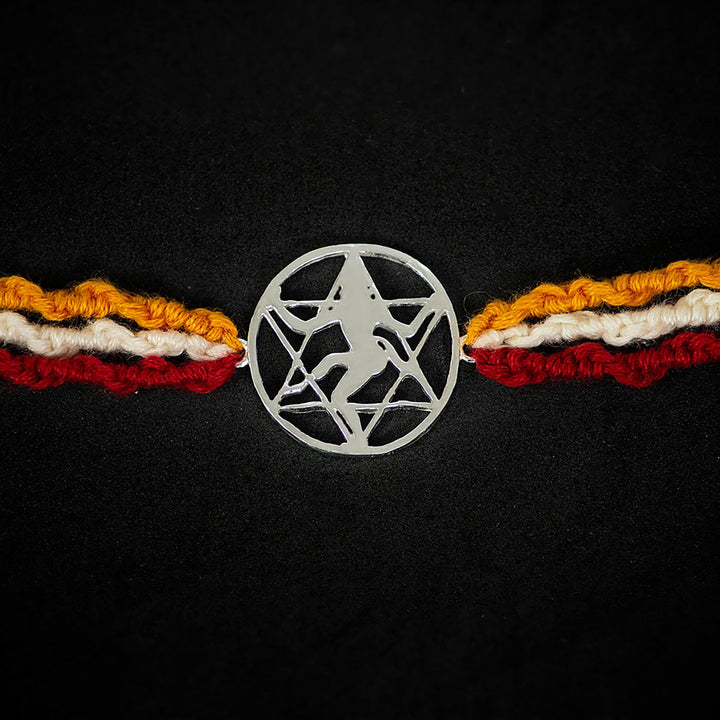 Handmade Bhairav 925 Silver Rakhi With Roli Chawal For Brother - Close-up of central charm and threads