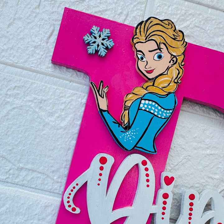 Personalized Hand Painted Elsa Adventure Mdf Wood Monogram With 3D Letters - Hanging on Textured Wall Close-up
