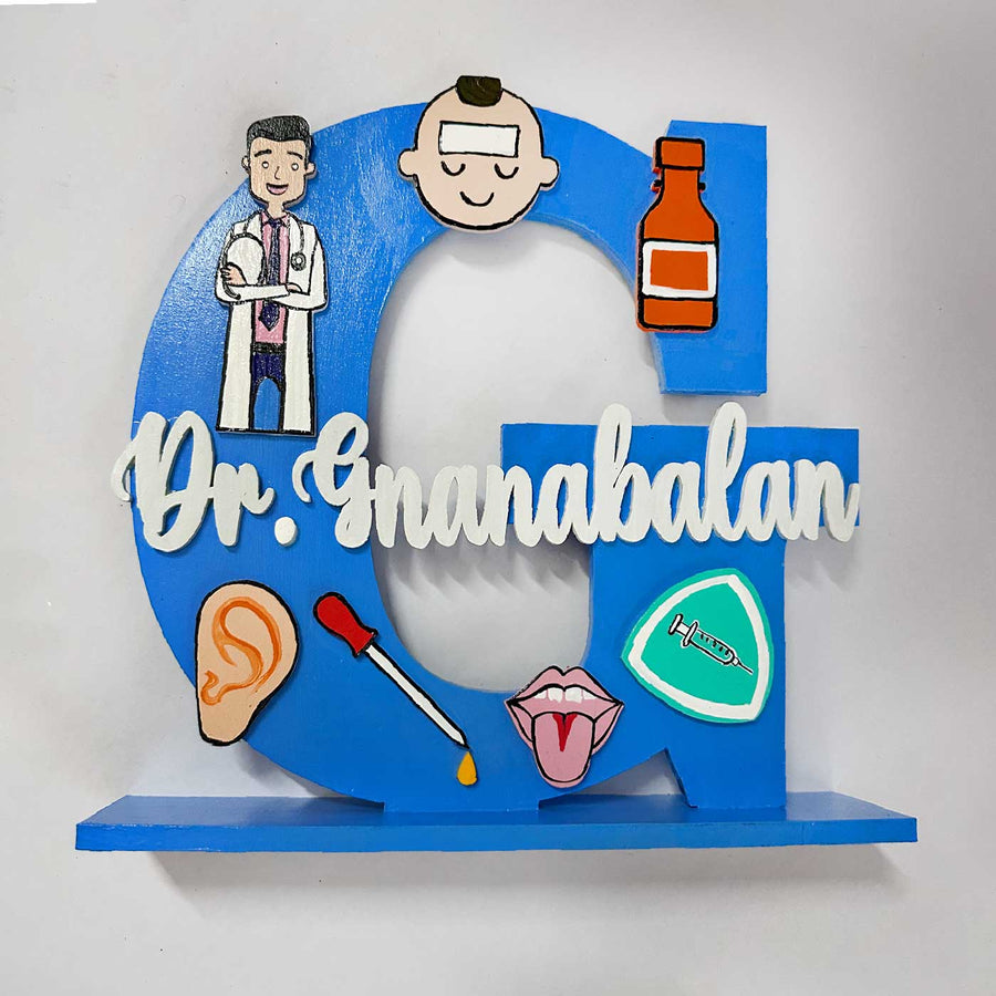 9 Inch Personalized Hand Painted Pediatricians Pride Mdf Wood Name Plate With 3D Letters - Front View on Tabletop Stand