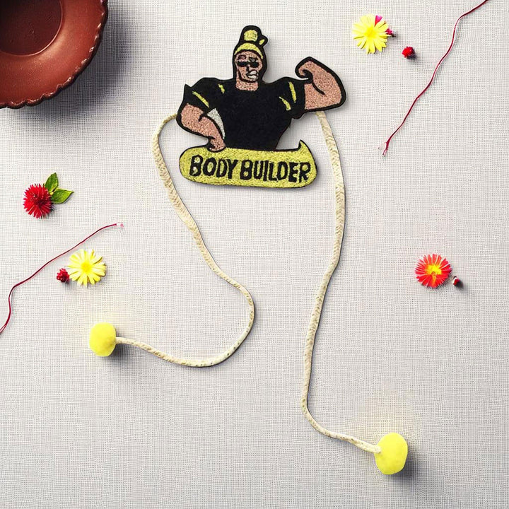Handmade Reusable Body Builder Pom Pom Felt Kids Rakhi - Top View with Decorative Elements