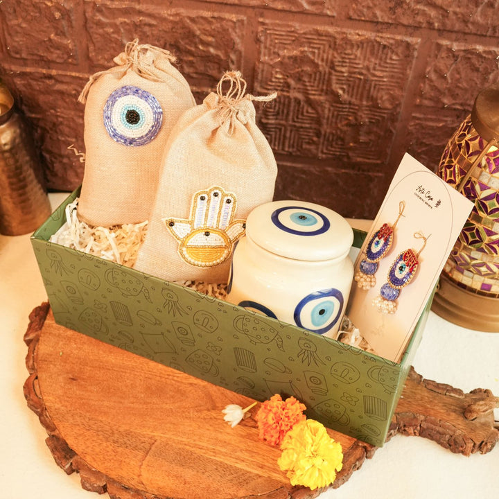 Shubh Nazar Diwali Gift Hamper | Includes 1 Storage Container, 2 Hangings, 2 Dry Fruit Potlis, 1 Diwali Card, 1 Gift Box