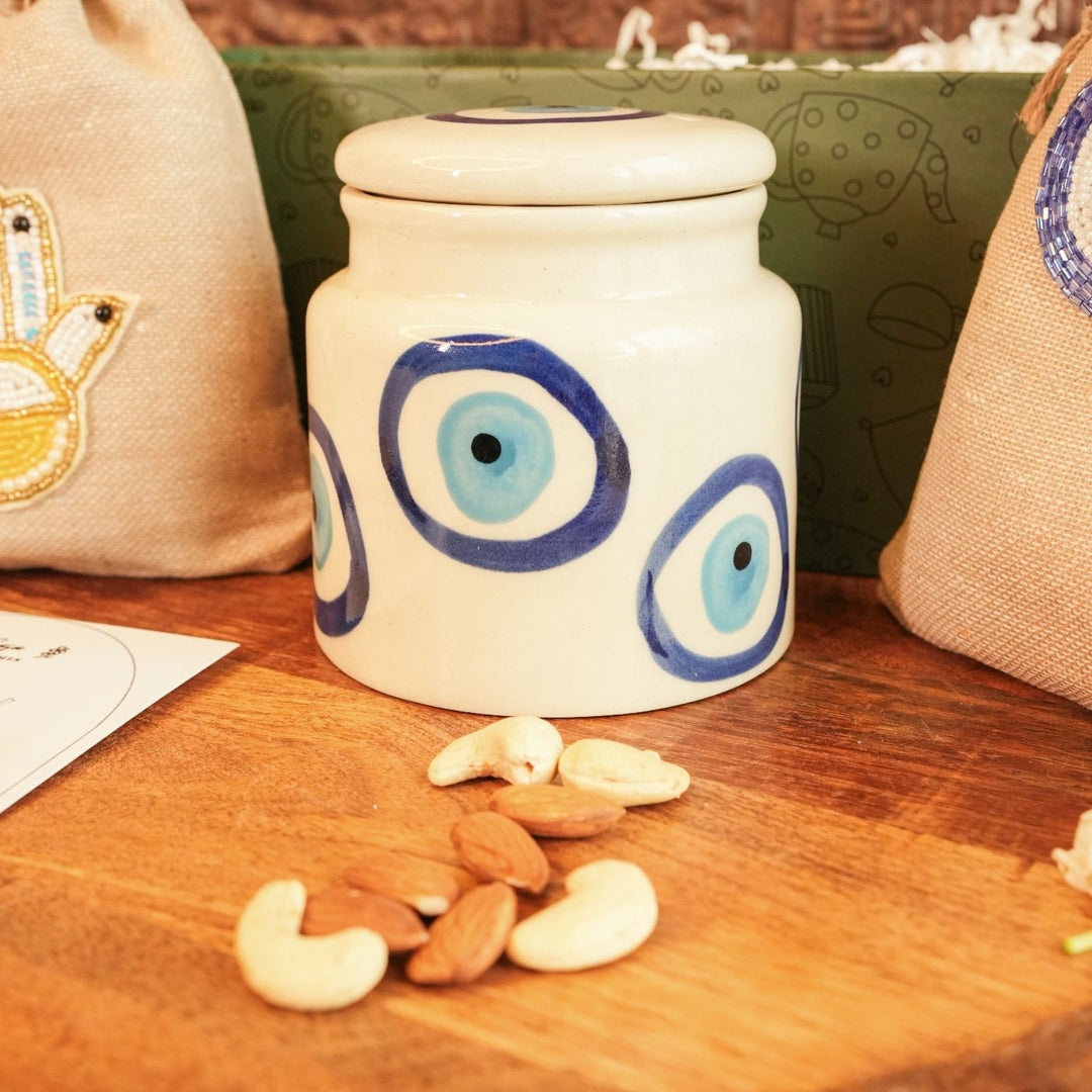 Shubh Nazar Diwali Gift Hamper | Includes 1 Storage Container, 2 Hangings, 2 Dry Fruit Potlis, 1 Diwali Card, 1 Gift Box