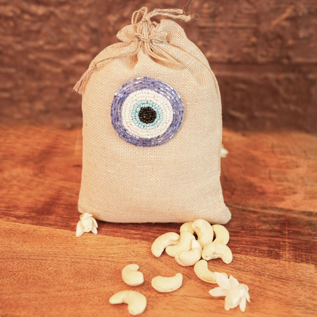 Shubh Nazar Diwali Gift Hamper | Includes 1 Storage Container, 2 Hangings, 2 Dry Fruit Potlis, 1 Diwali Card, 1 Gift Box