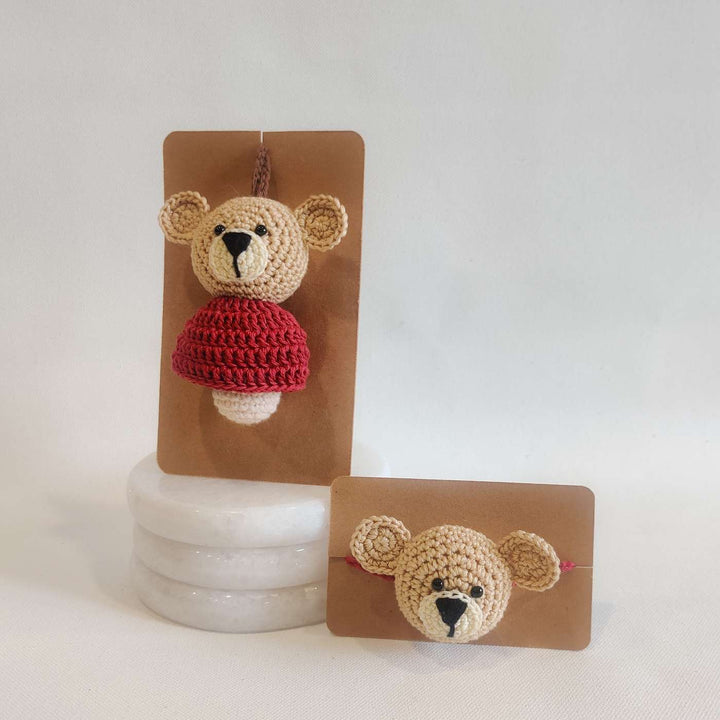 Handmade Crochet Teddy Hug Kids Rakhi With Roli Chawal - Packaged Front View with Blue Thread