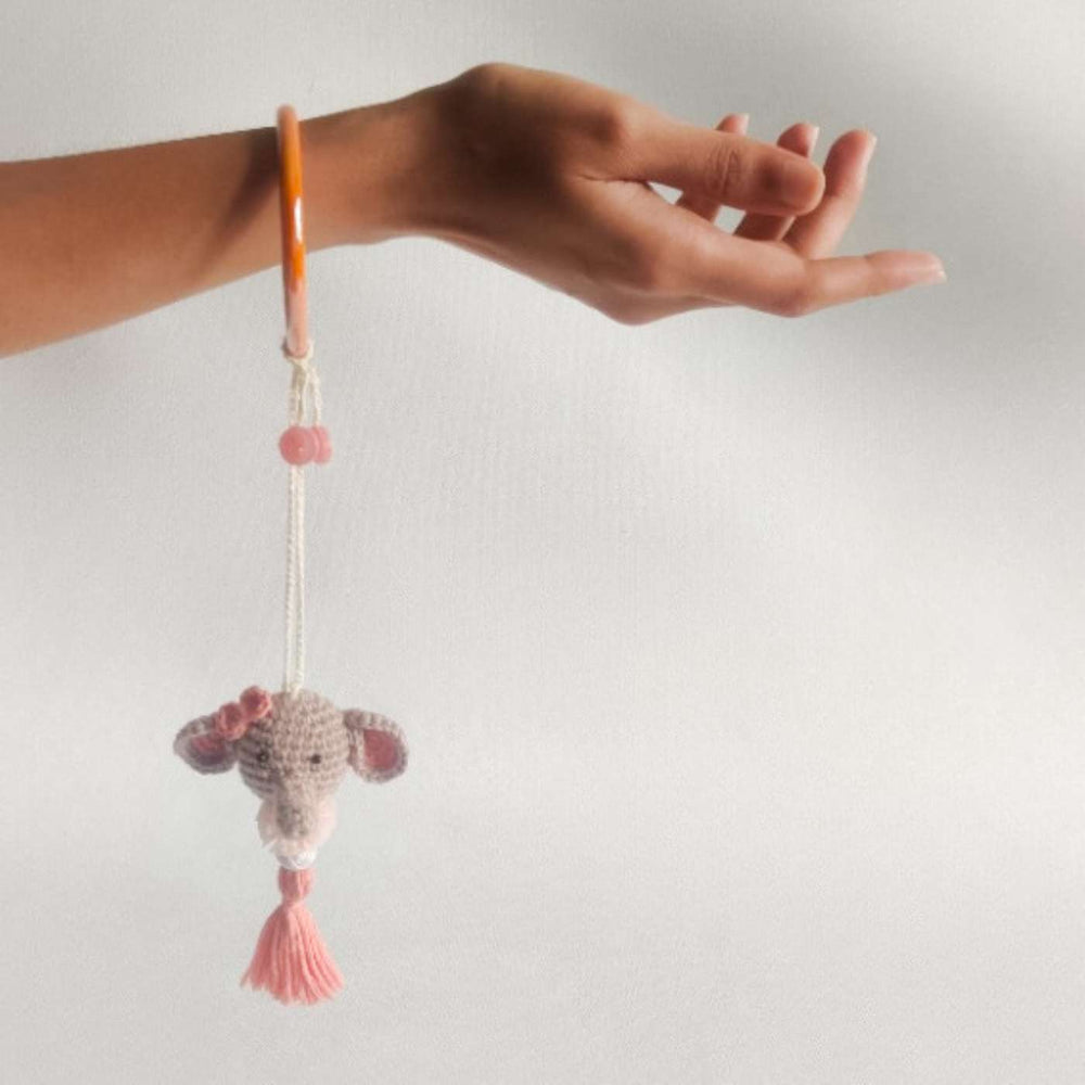 Handmade Crochet Dumbo Kids Rakhi With Roli Chawal - Hand Holding Toy Display