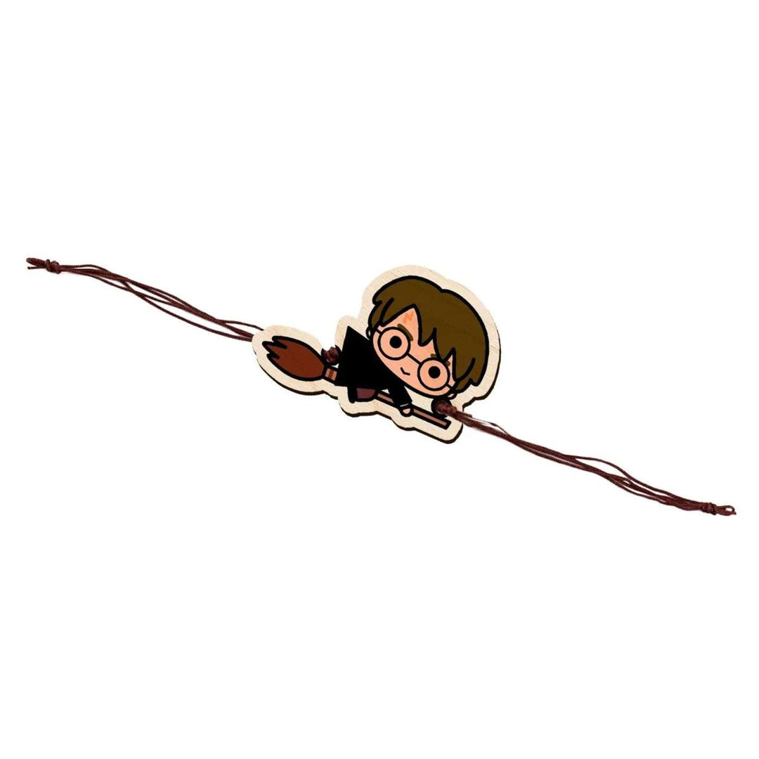 Handmade Harry Potter Broom Wooden Kids Rakhi With Roli Chawal - Flat lay on white background
