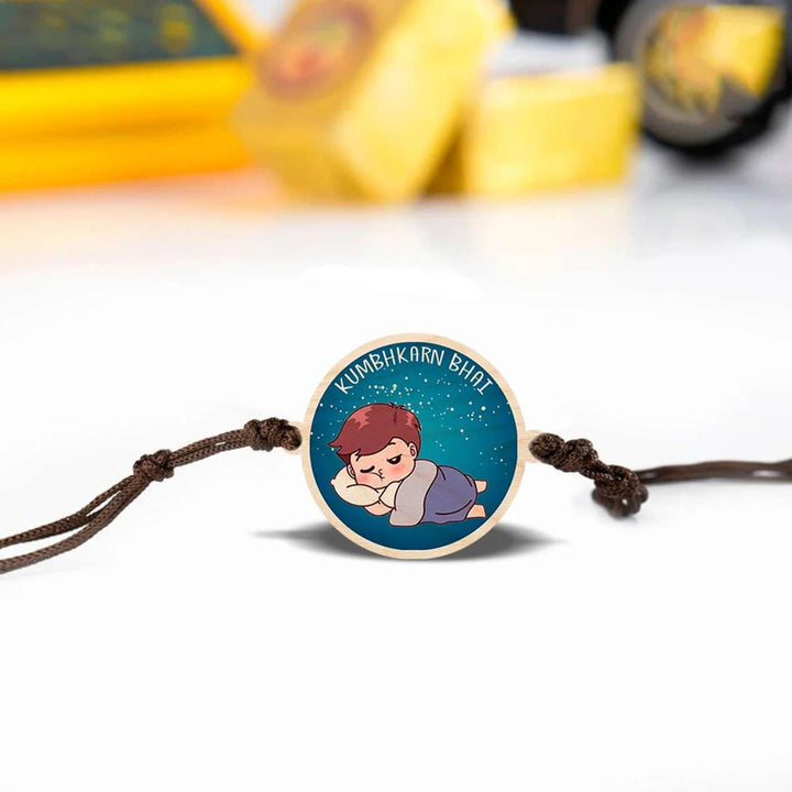 Handmade Kumbhkaran Bhai Wooden Rakhi With Roli Chawal - Flat Lay with Blurred Background