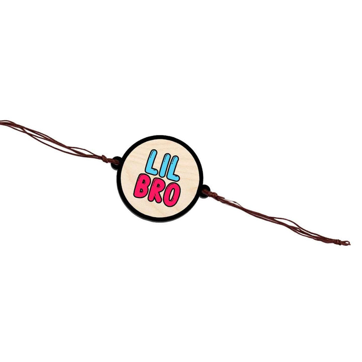 Handmade Little Bro Wooden Rakhi With Roli Chawal - Full bracelet flat lay isolated