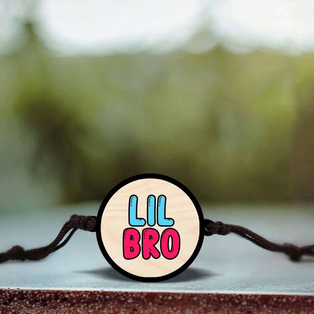 Handmade Little Bro Wooden Rakhi With Roli Chawal - Bracelet centerpiece with natural background