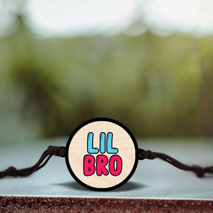 Handmade Little Bro Wooden Rakhi With Roli Chawal - Bracelet centerpiece with natural background