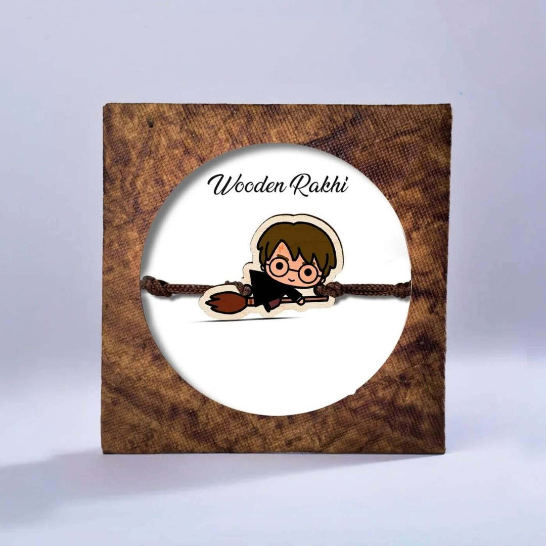 Handmade Harry Potter Broom Wooden Kids Rakhi With Roli Chawal - Packaged Rakhi display