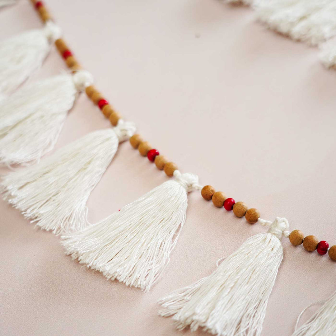 Handmade White Tassel Garland Bunting For Christmas Wall Decoration 2 - Close-up of Hanging Tassel Garland