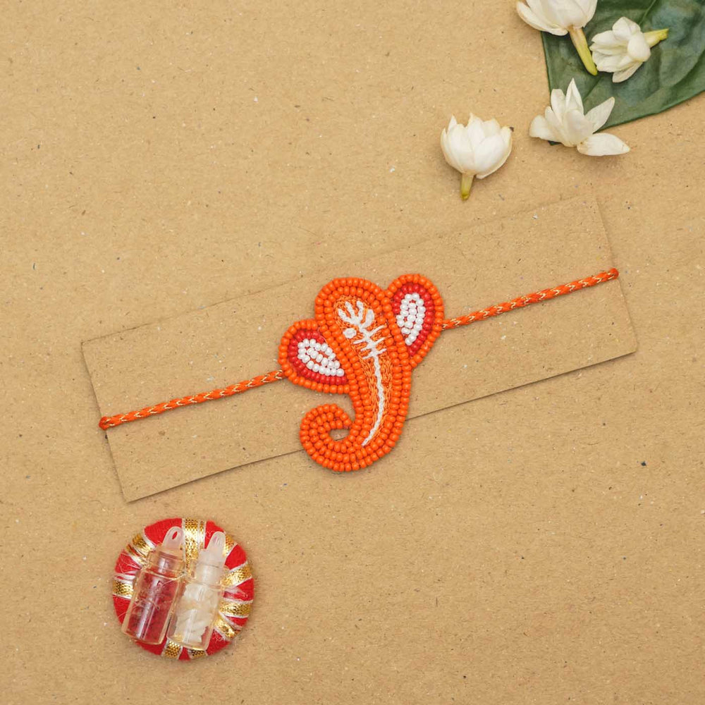 Handmade Beaded Ganpati Rakhi With Roli Chawal - Rakhi on craft card base