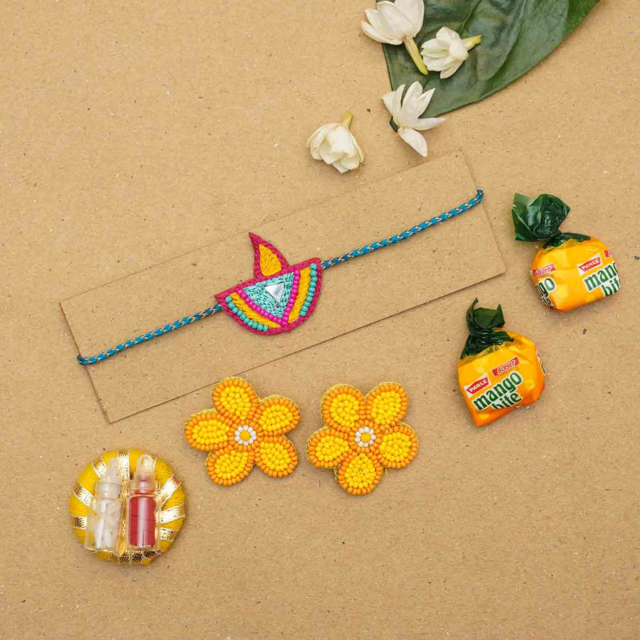 Handmade Beaded Mango Bite Rakhi Hamper For Sisters Set Of 4 - Flat Lay with Accessories