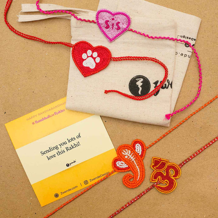 Handmade Beaded Ganpati Rakhi With Roli Chawal - Grouped Rakhi set with packaging and card