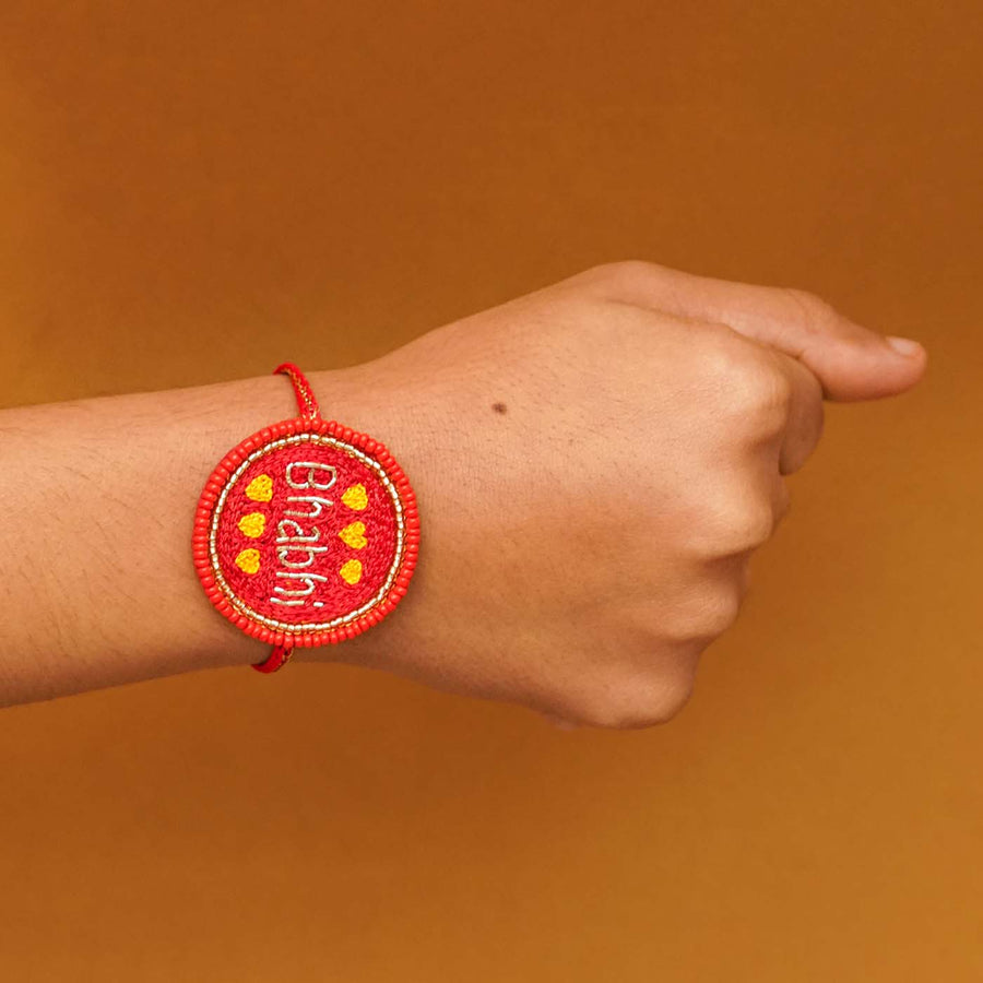 Handmade Beaded Bhabhi Rakhi With Roli Chawal - Wrist Wearing View