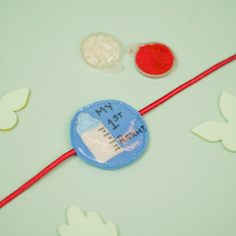 Handmade Feeding Bottle Theme Blue Felt Kids Rakhi For Brother - Styled with Rakhi Accessories