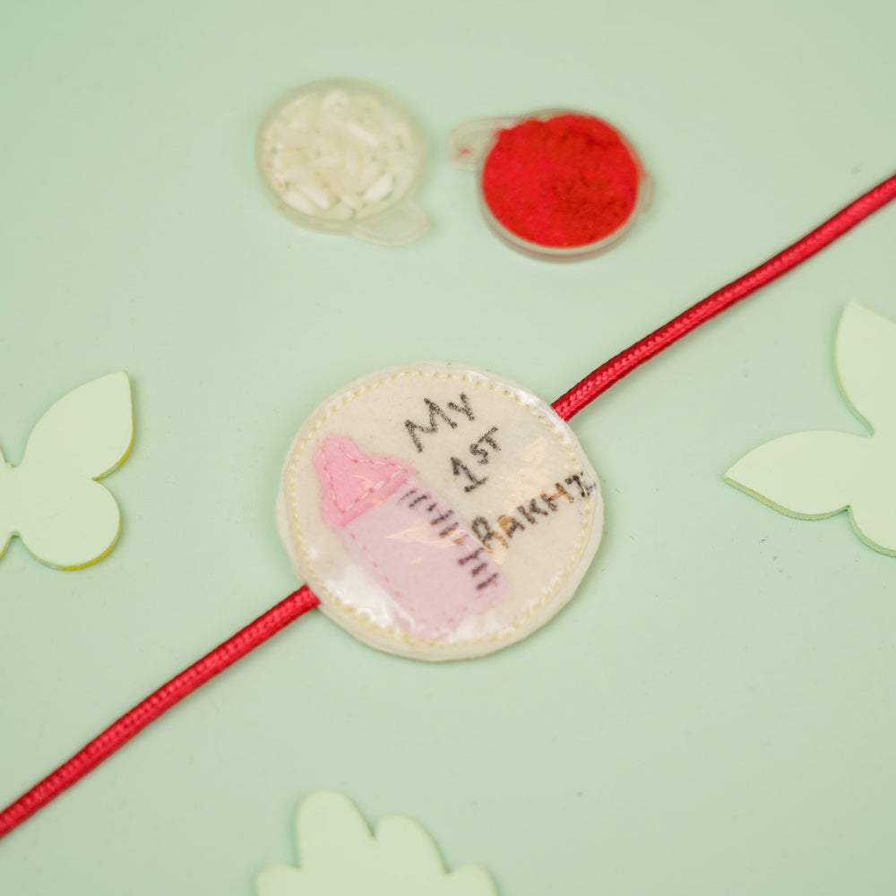 Handmade Feeding Bottle Theme Girl Felt Kids Rakhi For Sisters - Rakhi with Rice and Kumkum