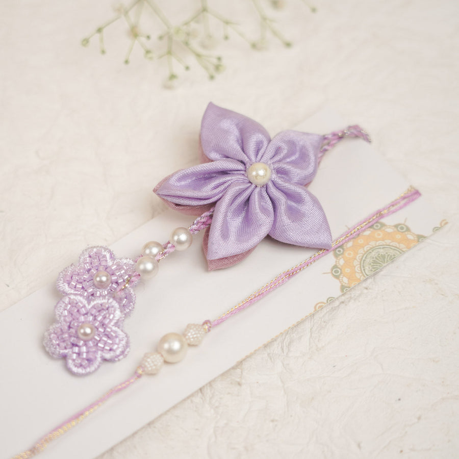 Handmade Dual Flower Pearl Design Bhaiya Bhabhi Rakhi With Roli Chawal - Front View with Decorative Flowers