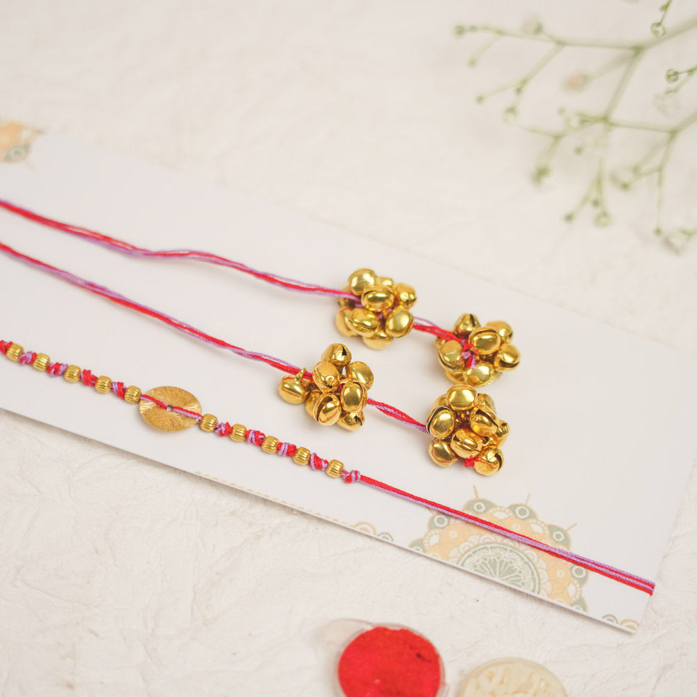 Handmade Swarn Sutra Ghungroo Bhaiya Bhabhi Rakhi With Roli Chawal - Close-up of Bell Detail