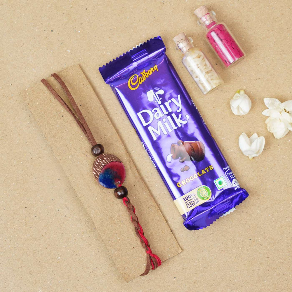 Handmade Rudra Textured Red Copper Enamel Rakhi With Chocolates And Roli Chawal - Rakhi with chocolate gift set