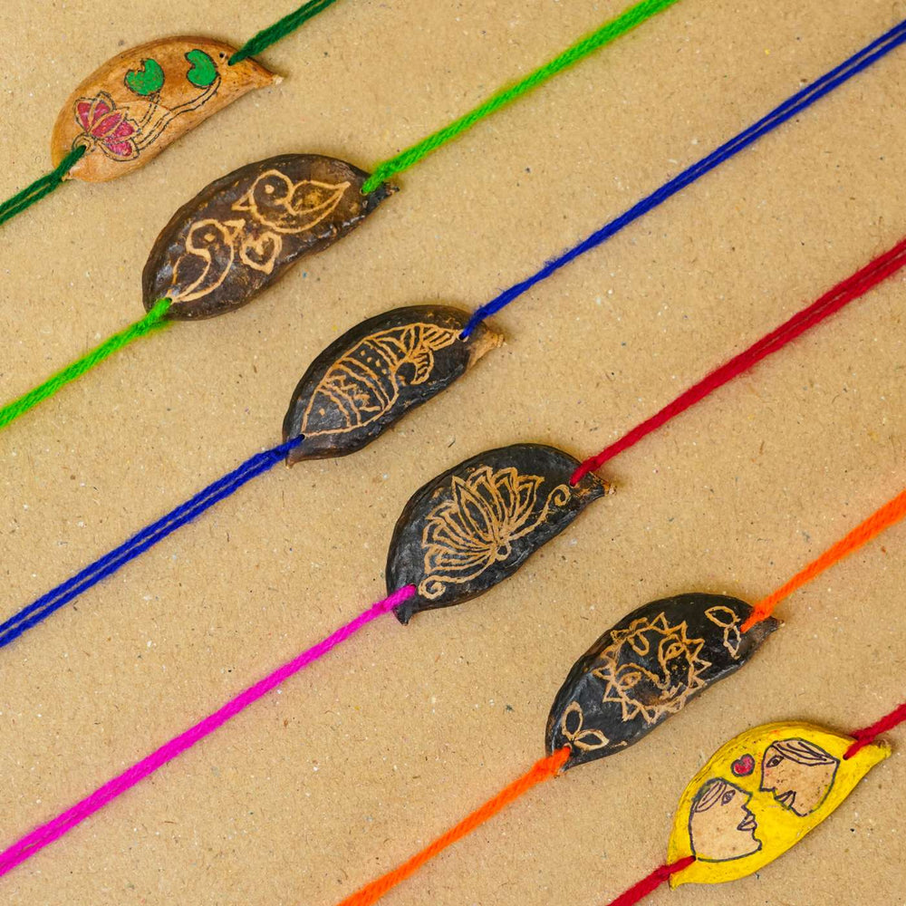 Handmade Plantable Magenta Lotus Seed Rakhi With Roli Chawal - Multiple rakhis in various colors