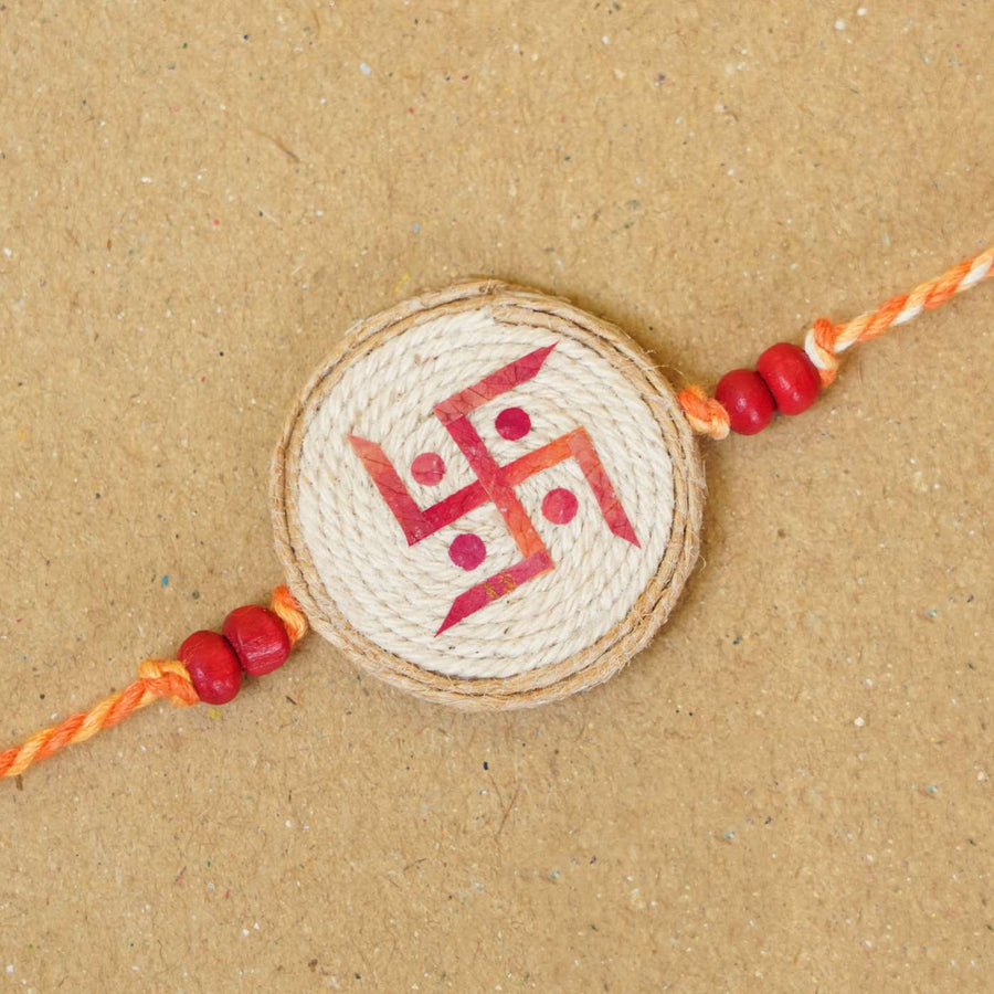 Handmade Pressed Flower Art Swastika Jute Rakhi With Roli Chawal - Close-up of single bracelet