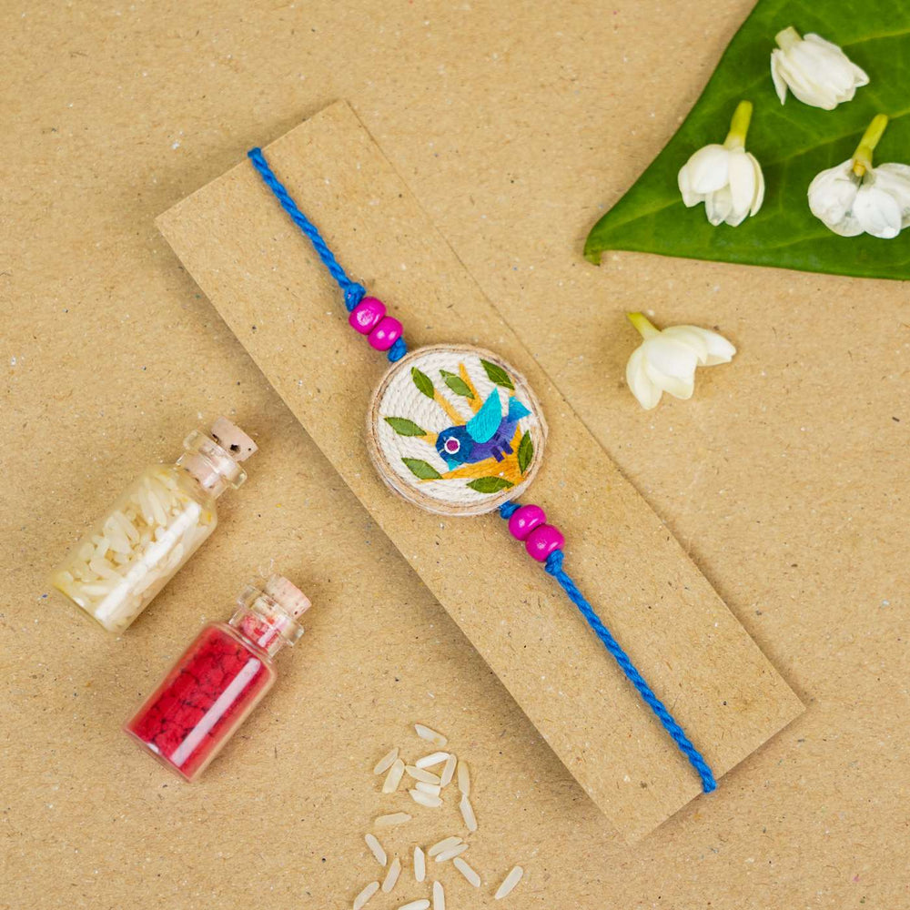 Handmade Pressed Flower Art Bluebird Jute Bhaiya Bhabhi Rakhi With Roli Chawal Set Of 2 - Single rakhi with decorative beads