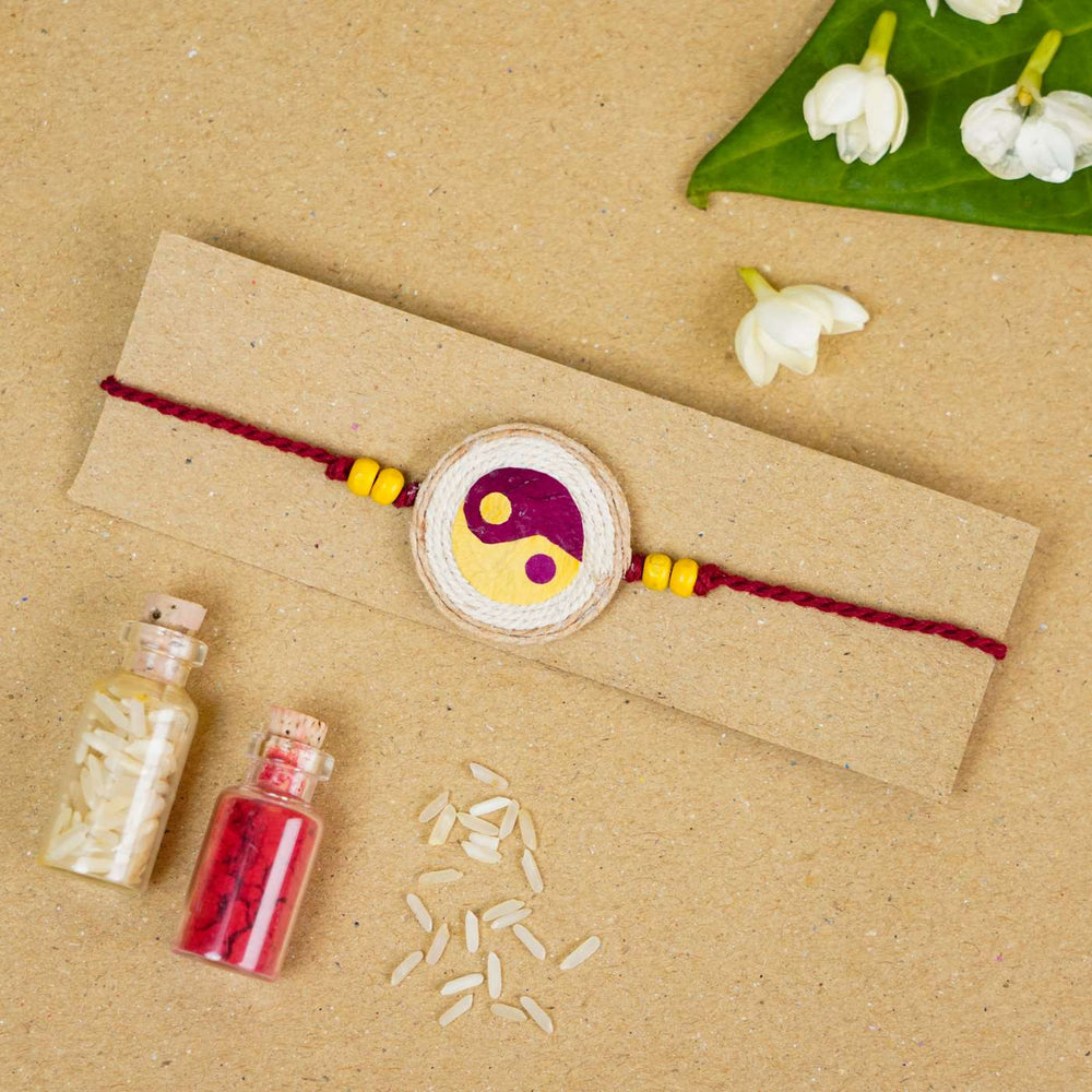 Handmade Pressed Flower Art Yin And Yang Jute Rakhi With Roli Chawal - Packaged Rakhi with Decorative Elements