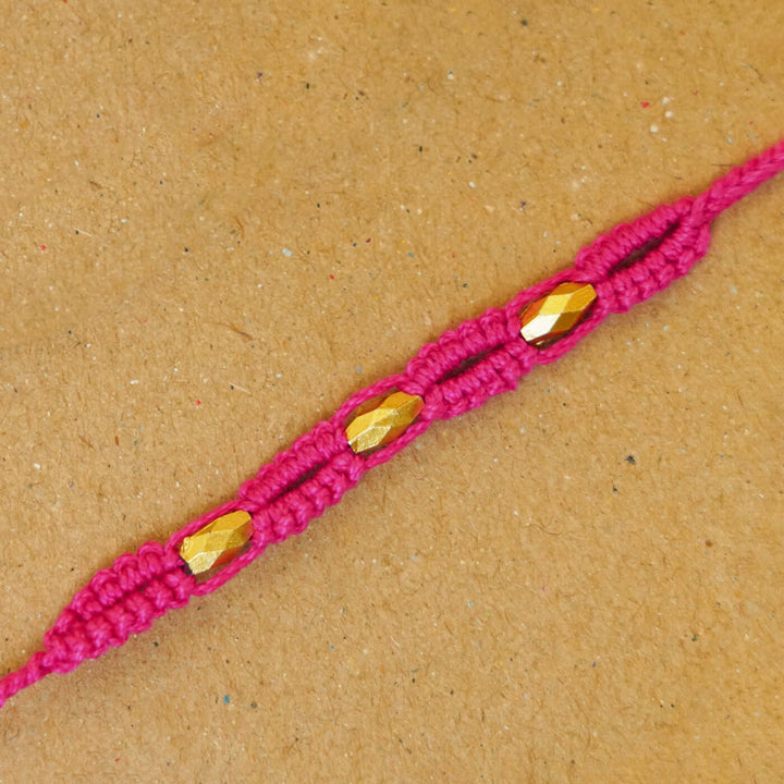 Handmade Macrame Three Gold Beaded Rakhi With Roli Chawal - Close-up Detail (14)
