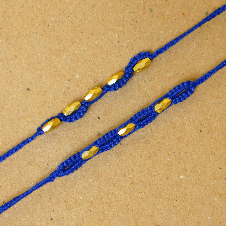 Handmade Macrame Beaded Rakhi With Roli Chawal Set Of 2 - Close-up of blue pair