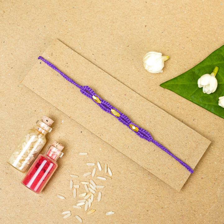 Handmade Macrame Three Gold Beaded Rakhi With Roli Chawal - Displayed on Card with Props (19)