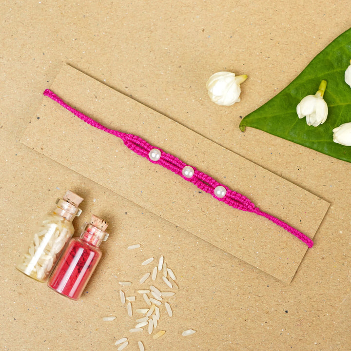 Handmade Macrame Three Pearl Rakhi With Roli Chawal - Flat Lay with Decorative Items (14)