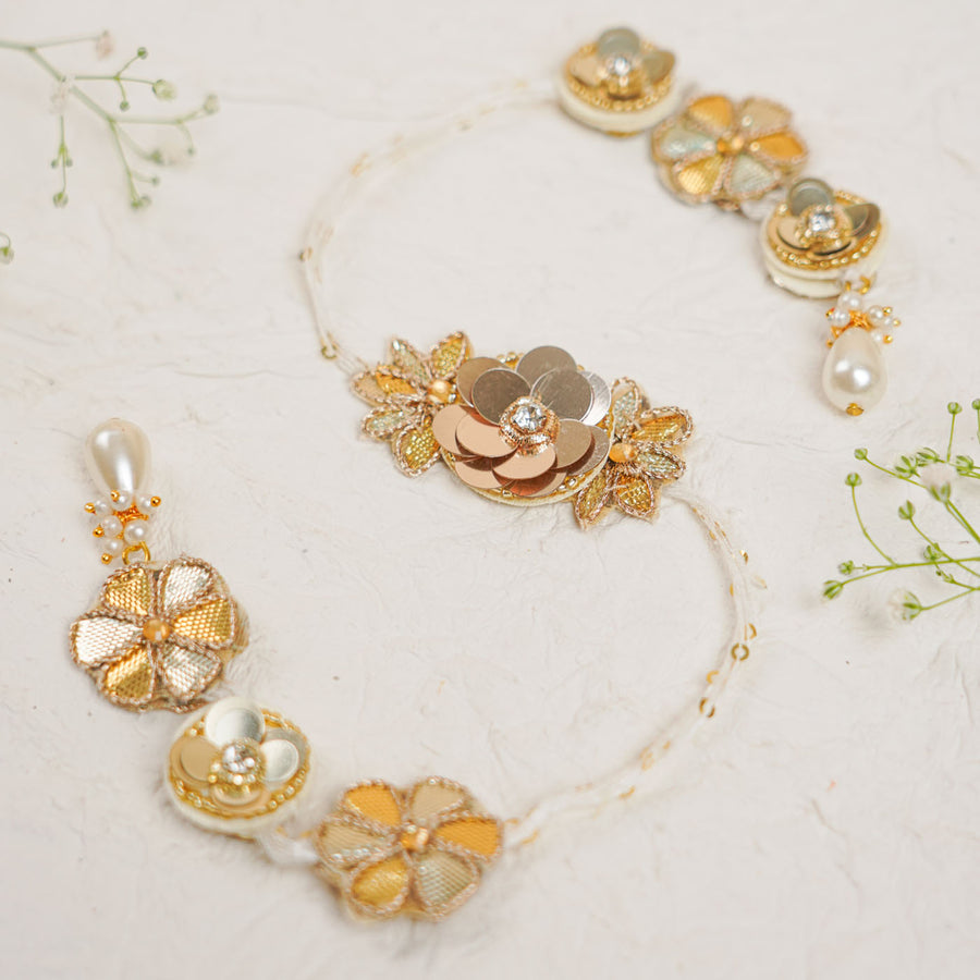 Handmade White Sequin Boota Rakhi And Lumba With Roli Chawal - Close-up of Full Bracelet