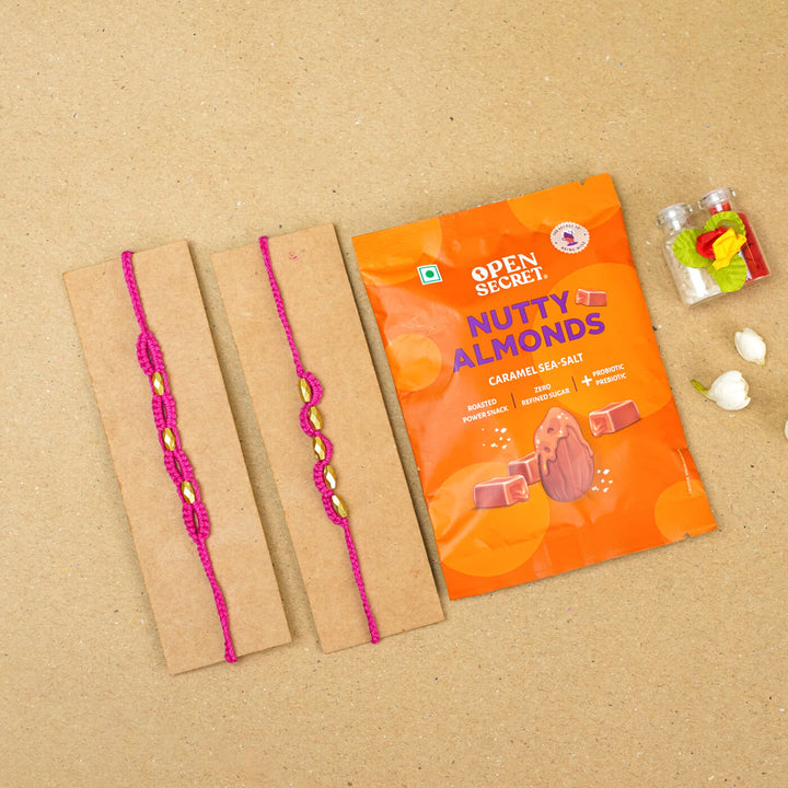 Handmade Macrame Beaded Rakhi With Roli Chawal Set Of 2 - Pink pair with packaging