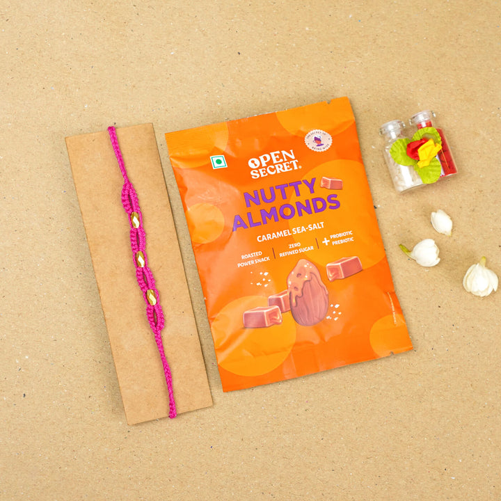 Handmade Macrame Three Gold Beaded Rakhi With Roli Chawal - Displayed on Card with Packaged Snack (16)