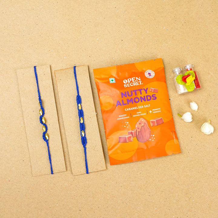 Handmade Macrame Beaded Rakhi With Roli Chawal Set Of 2 - Blue pair with packaging