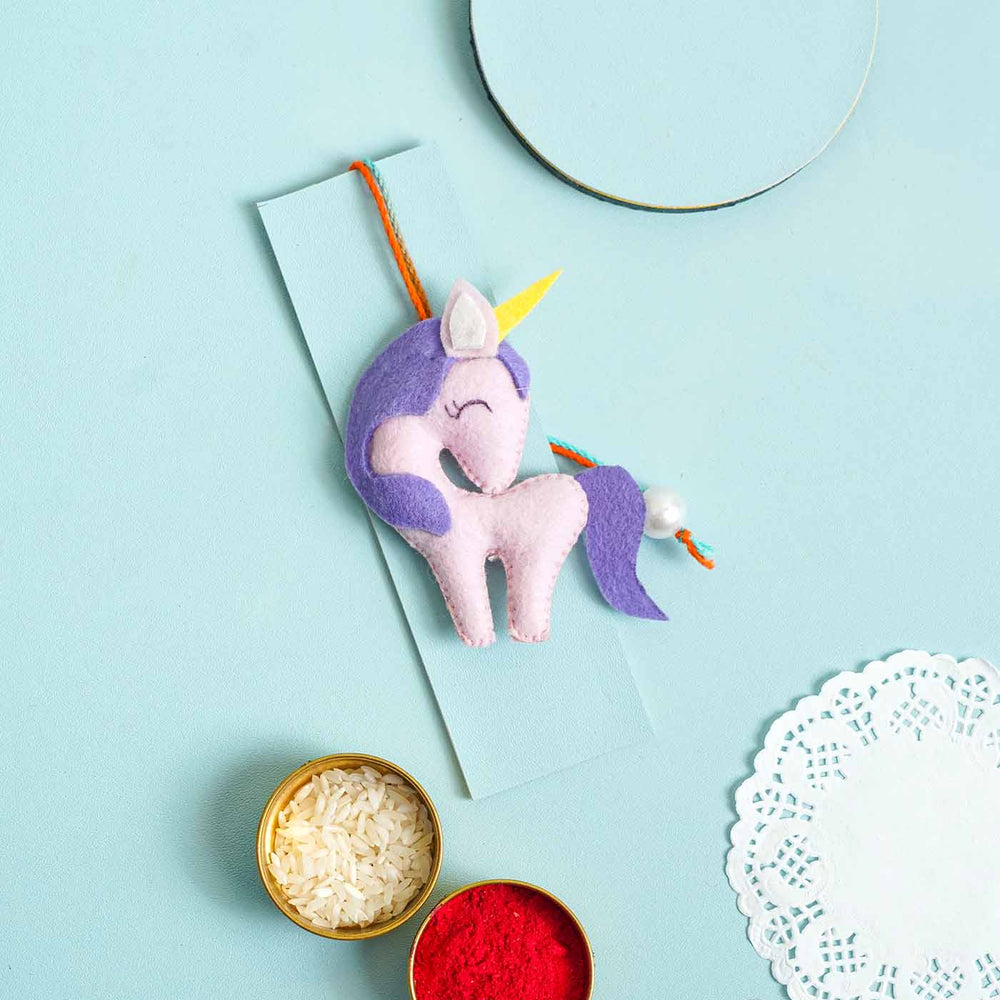 Personalized Handmade Unicorn Felt Rakhi With Roli Chawal - Styled with Cultural Items